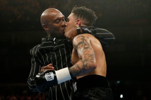 A good start: Conor receives a kiss from his proud father, Nigel Benn