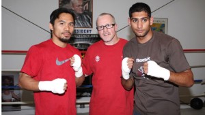 Freddie Roach with his two fighters back in the day. 